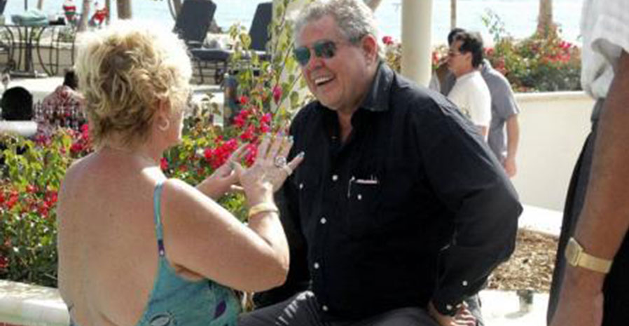 Sandals Chairman Gordon 'Butch' Stewart in discussion with a guest at one of his Sandals Resorts hotels. Stewart, one of the chosen advisers to Tourism Minister Edmund Bartlett, revolutionised Jamaica’s tourism market with his all-inclusive hotel operations. 